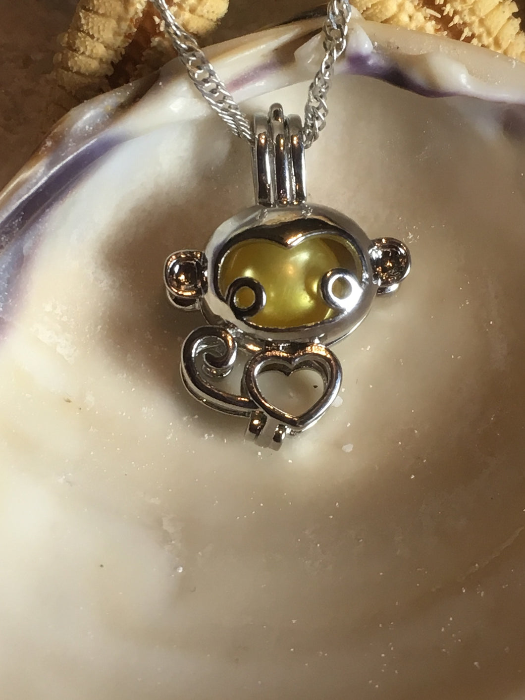 Monkey Cage Pendant